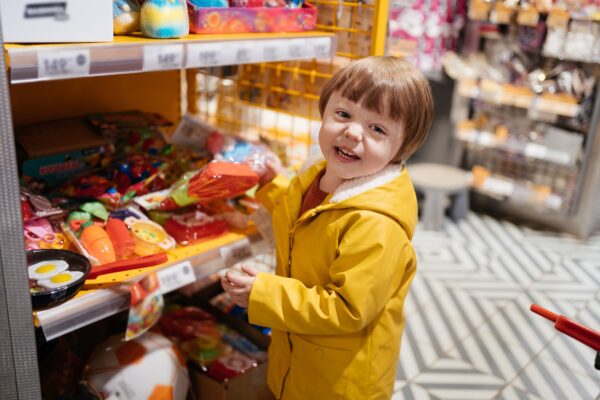 joyful child shopping in the market